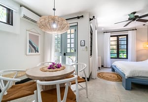 Bright and airy bedroom with private balcony overlooking Las Catalinas town at 18 Calle La Ronda Costa Rica home for sale