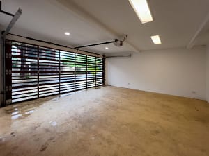 Private covered garage with modern design at Tamarindo Park #51 in Playa Tamarindo, Costa Rica.
